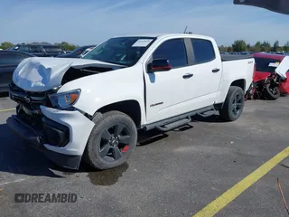 2021 Chevrolet Colorado 2WD LT z VIN 1GCGSCEN3M1276560, wystawiony jako IAAI lot #41442039 z przebiegiem 82 538 mil mil oraz . Historia ofert i sprzedaży dostępna na DreamBid. Obrazek 2.