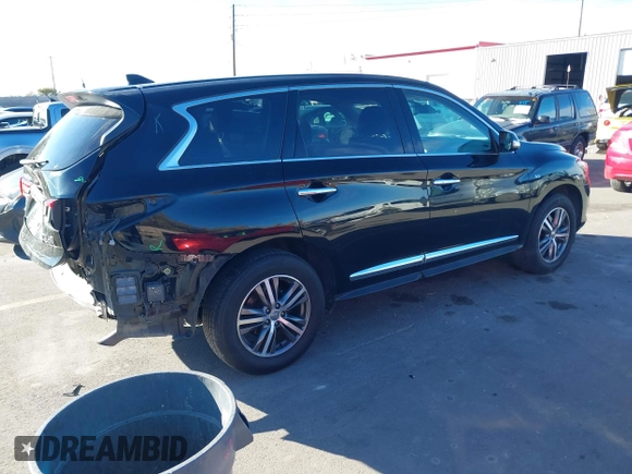 2020 Infiniti QX60 Luxe with VIN 5N1DL0MM5LC522210, listed as a IAAI auction lot 40913550 with 90,289 mi miles and . Bid and sale history available at DreamBid. Image 4.