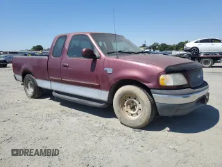 1999 Ford F-150 XL with VIN 1FTRX17L2XKB78998, listed as a Copart auction lot 65004535 with 155,271 mi miles and Salvage title. Bid and sale history available at DreamBid. Image 4.