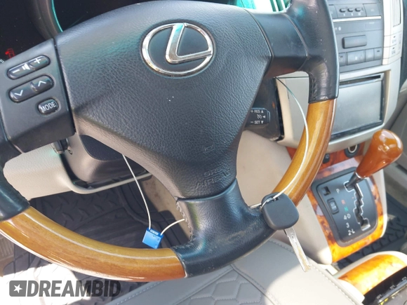 2007 Lexus RX 350 with VIN 2T2GK31U37C016300, listed as a IAAI auction lot 42114206 with 145,443 mi miles. Bid and sale history available at carsss.com. Image 11.