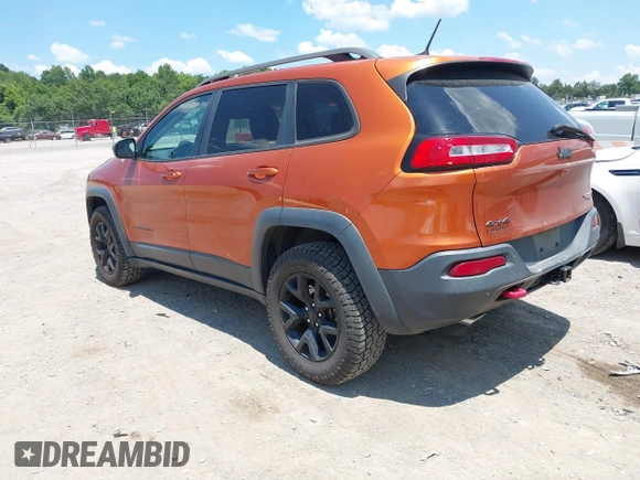 2016 Jeep Cherokee Trailhawk with VIN 1C4PJMBS6GW318035, listed as a IAAI auction lot 42652034 with 187,519 mi miles and . Bid and sale history available at DreamBid. Image 3.