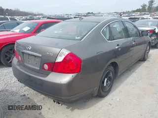 2007 Infiniti M45 Sdn with VIN JNKBY01E17M400971, listed as a IAAI auction lot 41689162 with 214,776 mi miles. Bid and sale history available at carsss.com. Image 4.