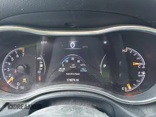 2014 Jeep Grand Cherokee Limited with VIN 1C4RJFBG8EC553860, listed as a IAAI auction lot 42452419 with 174,274 mi miles and . Bid and sale history available at DreamBid. Image 7.