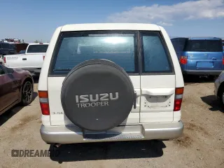 1999 Isuzu Trooper S z VIN JACDJ58X6X7912631, wystawiony jako Copart lot #74153604 z przebiegiem 141 037 mil mil oraz Szkoda całkowita • Salvage title. Historia ofert i sprzedaży dostępna na DreamBid. Obrazek 6.