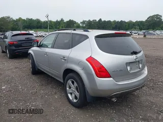 2004 Nissan Murano SE z VIN JN8AZ08W24W312041, wystawiony jako IAAI lot #39833782 z przebiegiem 72 664 mil mil oraz . Historia ofert i sprzedaży dostępna na DreamBid. Obrazek 3.