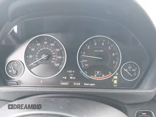 2014 BMW 3 Series 335i with VIN WBA3A9C56EF479564, listed as a IAAI auction lot 41578397 with 136,637 mi miles. Bid and sale history available at carsss.com. Image 7.