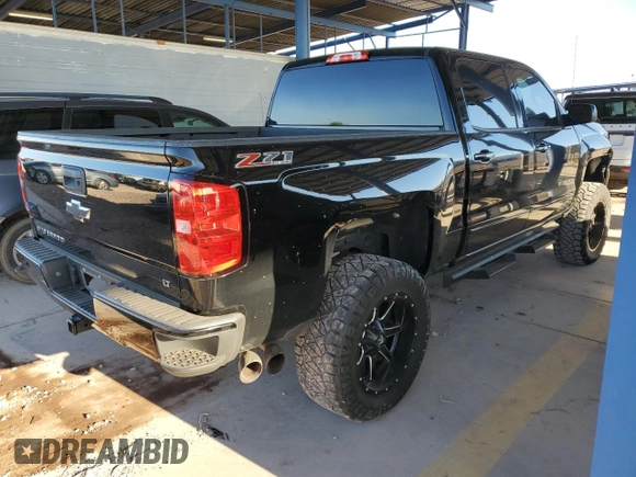 2017 Chevrolet Silverado 1500 LT with VIN 3GCUKREC1HG363756, listed as a Copart auction lot 54429565 with 182,515 mi miles and Salvage Title. Bid and sale history available at DreamBid. Image 3.