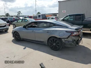 2020 Nissan Maxima SR with VIN 1N4AA6EV2LC379097, listed as a Copart auction lot 58047325 with 76,387 mi miles and Salvage title. Bid and sale history available at DreamBid. Image 2.