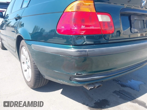 1999 BMW 3 Series 323i with VIN WBAAM3336XFP55691, listed as a IAAI auction lot 42033522 with 129,067 mi miles. Bid and sale history available at carsss.com. Image 6.