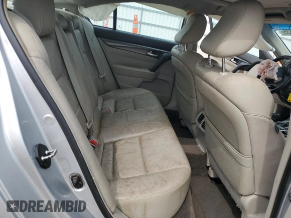 2012 Acura TL Auto z VIN 19UUA8F20CA028516, wystawiony jako Copart lot #52215635 z przebiegiem 163 418 mil mil oraz Nie do naprawy • Non repairable. Historia ofert i sprzedaży dostępna na DreamBid. Obrazek 11.