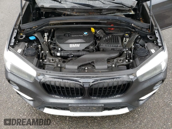 2018 BMW X1 xDrive28i with VIN WBXHT3C33J5K23187, listed as a Copart auction lot 71063192 with 97,403 mi miles. Bid and sale history available at carsss.com. Image 13.