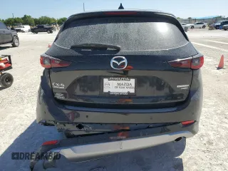 2024 Mazda CX-5 2.5 Turbo Signature with VIN JM3KFBXY2R0354346, listed as a Copart auction lot 49260525 with 9,571 mi miles and Salvage Title. Bid and sale history available at carsss.com. Image 6.