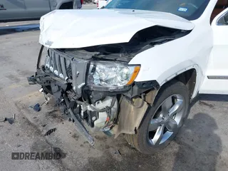 2013 Jeep Grand Cherokee Overland with VIN 1C4RJECT6DC533434, listed as a IAAI auction lot 41656116 with 122,809 mi miles. Bid and sale history available at carsss.com. Image 18.
