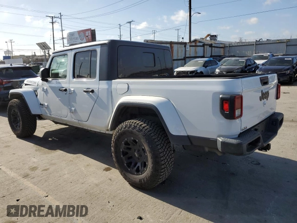 2021 Jeep Gladiator Sport S with VIN 1C6HJTAG3ML508147, listed as a Copart auction lot 56986865 with 43,407 mi miles and Salvage title. Bid and sale history available at DreamBid. Image 2.