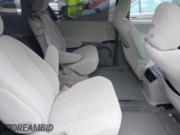 2014 Toyota Sienna LE AAS with VIN 5TDKK3DC3ES506466, listed as a IAAI auction lot 41908023 with 118,297 mi miles and . Bid and sale history available at carsss.com. Image 8.