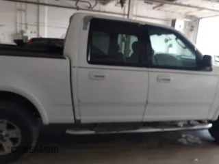 2003 Ford F-150 XLT with VIN 1FTRW08L03KB51627, listed as a IAAI auction lot 42497227 with 330,207 mi miles and . Bid and sale history available at DreamBid. Image 13.
