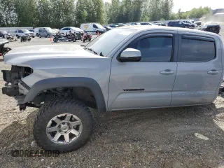 2020 Toyota Tacoma SR5 with VIN 3TMCZ5AN5LM346055, listed as a Copart auction lot 59662825 with 69,404 mi miles and Salvage title. Bid and sale history available at DreamBid. Image 1.