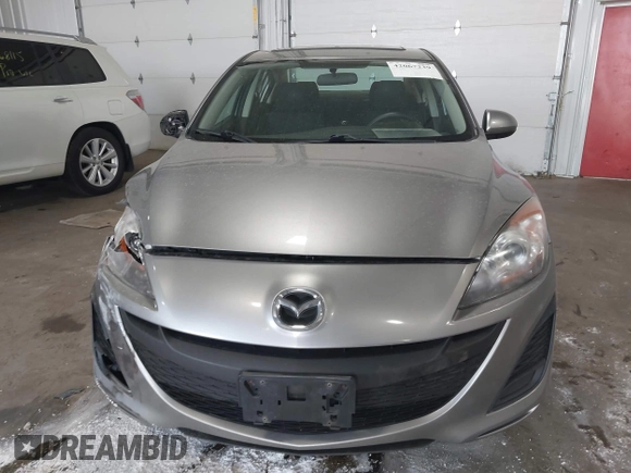 2011 Mazda Mazda3 i Touring with VIN JM1BL1VFXB1900999, listed as a IAAI auction lot 42067239 with 202,829 mi miles. Bid and sale history available at carsss.com. Image 12.