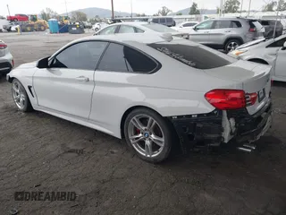 2016 BMW 4 Series 428i with VIN WBA3N7C54GK227752, listed as a IAAI auction lot 42003116 with 127,085 mi miles and . Bid and sale history available at DreamBid. Image 3.