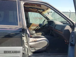 1997 Jeep Grand Cherokee Laredo with VIN 1J4GZ58S4VC633205, listed as a IAAI auction lot 41727571 with 201,228 mi miles. Bid and sale history available at carsss.com. Image 5.