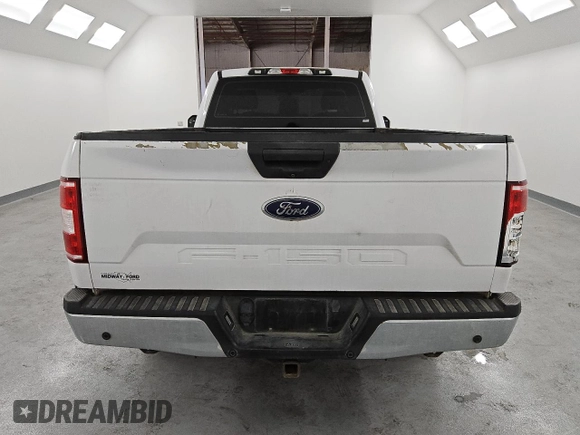 2020 Ford F-150 XL with VIN 1FTMF1C55LKE28314, listed as a Copart auction lot 85907654 with 127,340 mi miles and Clean Title. Bid and sale history available at carsss.com. Image 6.