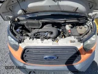 2016 Ford Transit Cargo z VIN 1FTYE1ZMXGKA40214, wystawiony jako Copart lot #50152665 z przebiegiem 253 484 mil mil oraz Tytuł czysty. Historia ofert i sprzedaży dostępna na DreamBid. Obrazek 12.