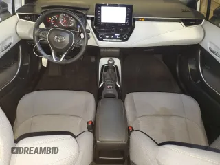 2021 Toyota Corolla SE with VIN 5YFM4MCE6MP076791, listed as a Copart auction lot 52024225 with 24,895 mi miles and Salvage Title. Bid and sale history available at carsss.com. Image 8.