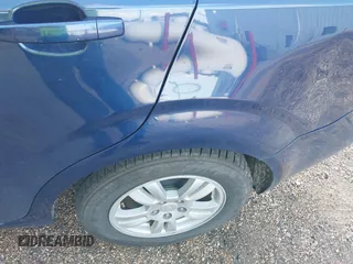 2014 Chevrolet Sonic LT with VIN 1G1JC5SH3E4228384, listed as a IAAI auction lot 41940480 with 127,176 mi miles and . Bid and sale history available at DreamBid. Image 12.