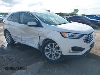 2020 Ford Edge Titanium with VIN 2FMPK3K98LBA42159, listed as a IAAI auction lot 42358229 with 88,512 mi miles and . Bid and sale history available at DreamBid. Image 1.
