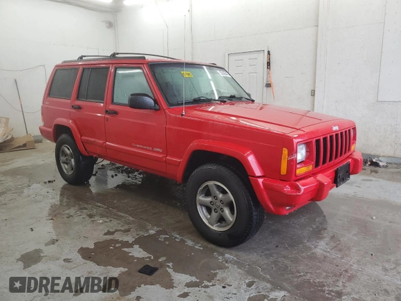 1998 Jeep Cherokee Sport with VIN 1J4FJ68S7WL148034, listed as a Copart auction lot 52436475 with 80,239 mi miles and Salvage Title. Bid and sale history available at carsss.com. Image 4.