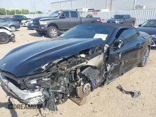 2022 BMW 8 Series with VIN WBAFY4C04NCJ78602, listed as a IAAI auction lot 42034279 with 11,757 mi miles and . Bid and sale history available at DreamBid. Image 6.
