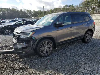 2019 Honda Passport EX-L with VIN 5FNYF7H5XKB001901, listed as a Copart auction lot 87186504 with 93,540 mi miles and Salvage Title. Bid and sale history available at carsss.com. Image 1.