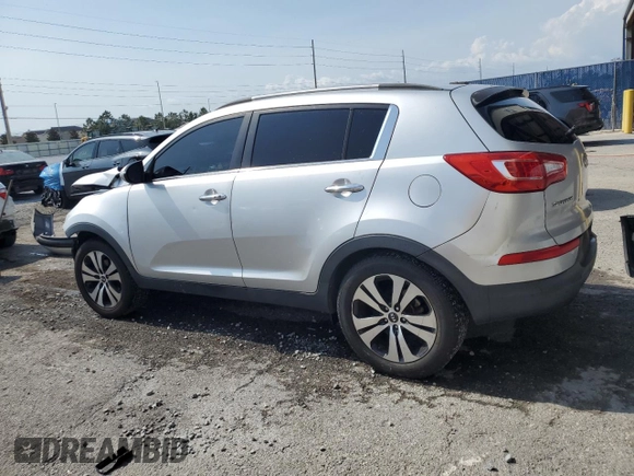 2012 Kia Sportage EX with VIN KNDPC3A21C7185453, listed as a Copart auction lot 56322245 with 142,410 mi miles and Salvage title. Bid and sale history available at DreamBid. Image 2.