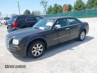 2006 Chrysler 300 Touring with VIN 2C3LA53G66H329729, listed as a IAAI auction lot 41946723 with 134,465 mi miles. Bid and sale history available at carsss.com. Image 2.