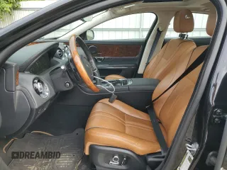 2019 Jaguar XJ R-Sport with VIN SAJWJ1CD1K8W18574, listed as a Copart auction lot 65041445 with 101,072 mi miles and Clean title. Bid and sale history available at DreamBid. Image 7.