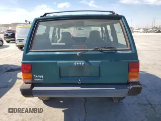1996 Jeep Cherokee Sport with VIN 1J4FJ68S3TL257912, listed as a Copart auction lot 77109634 with 53,841 mi miles and Clean Title. Bid and sale history available at carsss.com. Image 6.