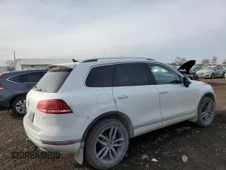 2016 Volkswagen Touareg Sport с VIN WVGEF9BPXGD011699, выставлен на аукционе Copart как лот 85089304 с пробегом 107 792 миль миль и Списание • Salvage title. История ставок и продаж доступна на DreamBid. Изображение 3.