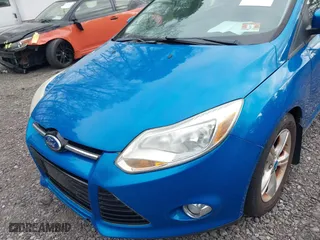 2012 Ford Focus SE with VIN 1FAHP3K23CL125307, listed as a IAAI auction lot 42056610 with 122,204 mi miles. Bid and sale history available at carsss.com. Image 6.