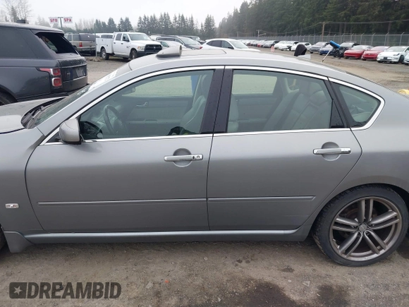 2007 Infiniti M Sport z VIN JNKAY01EX7M302565, wystawiony jako IAAI lot #41885272 z przebiegiem 151 745 mil mil oraz . Historia ofert i sprzedaży dostępna na DreamBid. Obrazek 14.