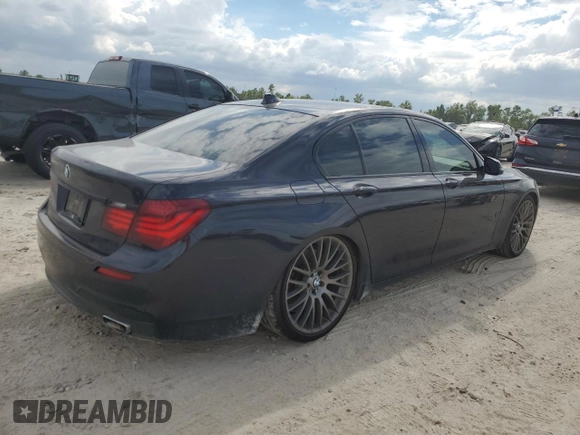2015 BMW 7 Series 750i with VIN WBAYA8C59FG197642, listed as a Copart auction lot 70282884 with 130,853 mi miles and Salvage title. Bid and sale history available at DreamBid. Image 3.