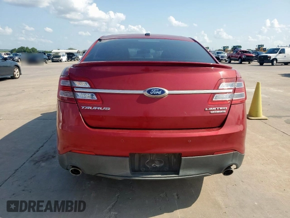 2014 Ford Taurus Limited with VIN 1FAHP2F89EG186567, listed as a Copart auction lot 61404285 with 188,890 mi miles and Salvage title. Bid and sale history available at DreamBid. Image 6.