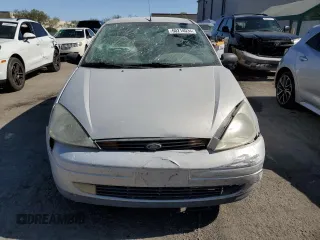 2000 Ford Focus ZX3 with VIN 3FAFP3132YR183435, listed as a Copart auction lot 60214034 with Not provided miles and Salvage title. Bid and sale history available at DreamBid. Image 5.