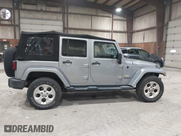 2014 Jeep Wrangler Unlimited Sahara with VIN 1C4BJWEG5EL164350, listed as a IAAI auction lot 42018586 with 113,222 mi miles. Bid and sale history available at carsss.com. Image 14.