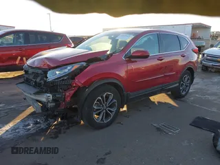 2020 Honda CR-V EX with VIN 2HKRW2H52LH603895, listed as a IAAI auction lot 41020943 with 216,688 mi miles. Bid and sale history available at carsss.com. Image 2.