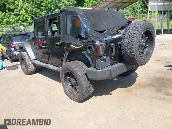 2015 Jeep Wrangler Unlimited Sport with VIN 1C4BJWDG2FL518487, listed as a IAAI auction lot 42593022 with 161,991 mi miles and . Bid and sale history available at DreamBid. Image 3.