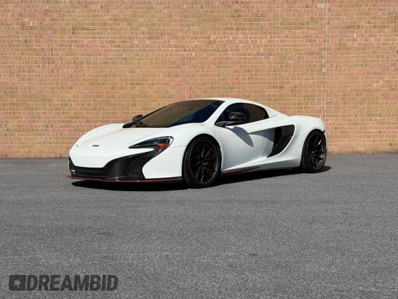 2016 McLaren 650S z VIN SBM11FAAXGW005605, wystawiony jako Copart lot #53181285 z przebiegiem 16 800 mil mil oraz Tytuł czysty. Historia ofert i sprzedaży dostępna na DreamBid. Obrazek 2.