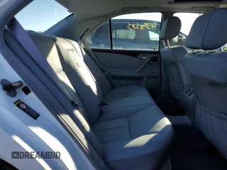 2000 Mercedes-Benz E-Class AWD with VIN WDBJF82G1YX028712, listed as a Copart auction lot 43983315 with 201,037 mi miles and Salvage Title. Bid and sale history available at carsss.com. Image 10.
