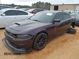 2021 Dodge Charger Scat Pack Widebody with VIN 2C3CDXGJ5MH579324, listed as a IAAI auction lot 41399676 with 77,156 mi miles and . Bid and sale history available at DreamBid. Image 17.