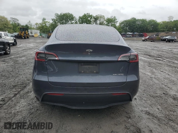 2021 Tesla Model Y Long Range z VIN 5YJYGDEE6MF233205, wystawiony jako Copart lot #58011025 z przebiegiem 48 419 mil mil oraz Szkoda całkowita • Salvage title. Historia ofert i sprzedaży dostępna na DreamBid. Obrazek 6.