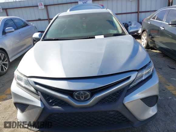 2019 Toyota Camry LE z VIN 4T1B11HK8KU681713, wystawiony jako IAAI lot #41823019 z przebiegiem 99 000 mil mil oraz . Historia ofert i sprzedaży dostępna na DreamBid. Obrazek 12.